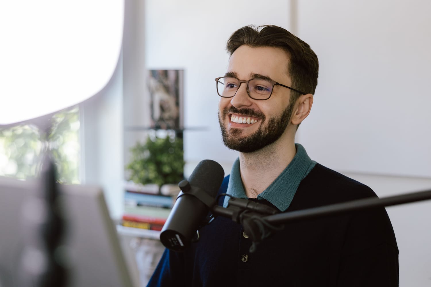 Devlin Peck recording the Devlin Peck Podcast